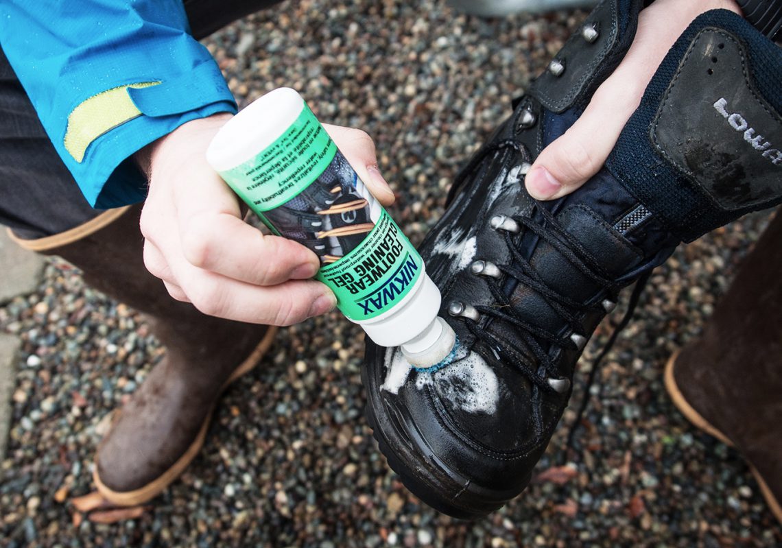 applying dubbin to boots