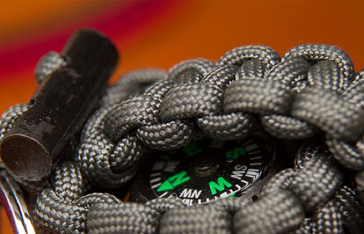 Compass inside paracord grenade