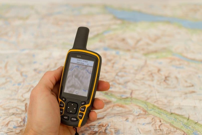 Hand held outdoor GPS and a map