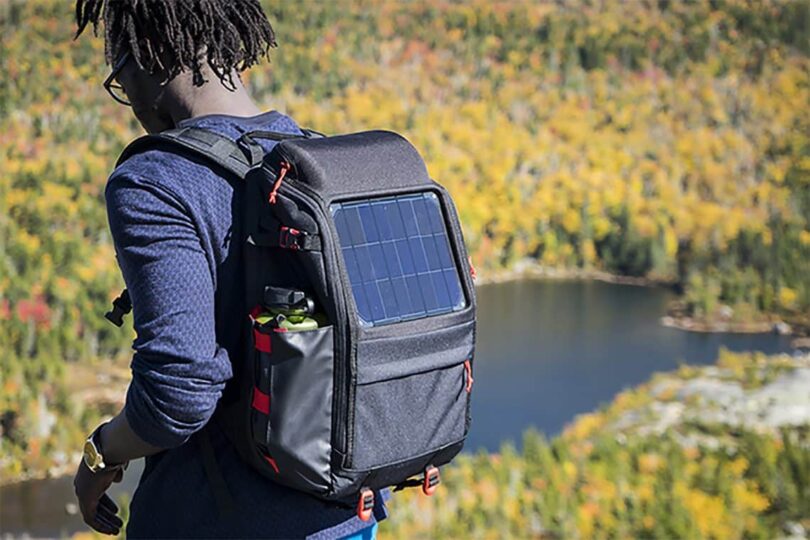 Man is Wearing Solar Backpack