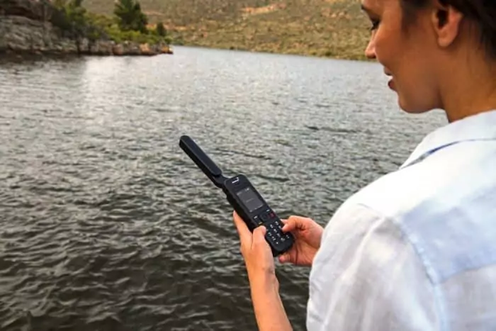 Woman Using Satellite Phone